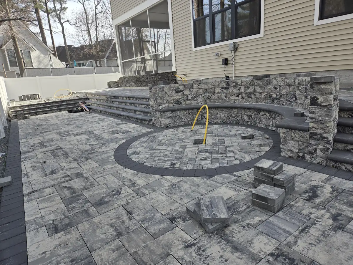 Paver patio with seating area and border pattern