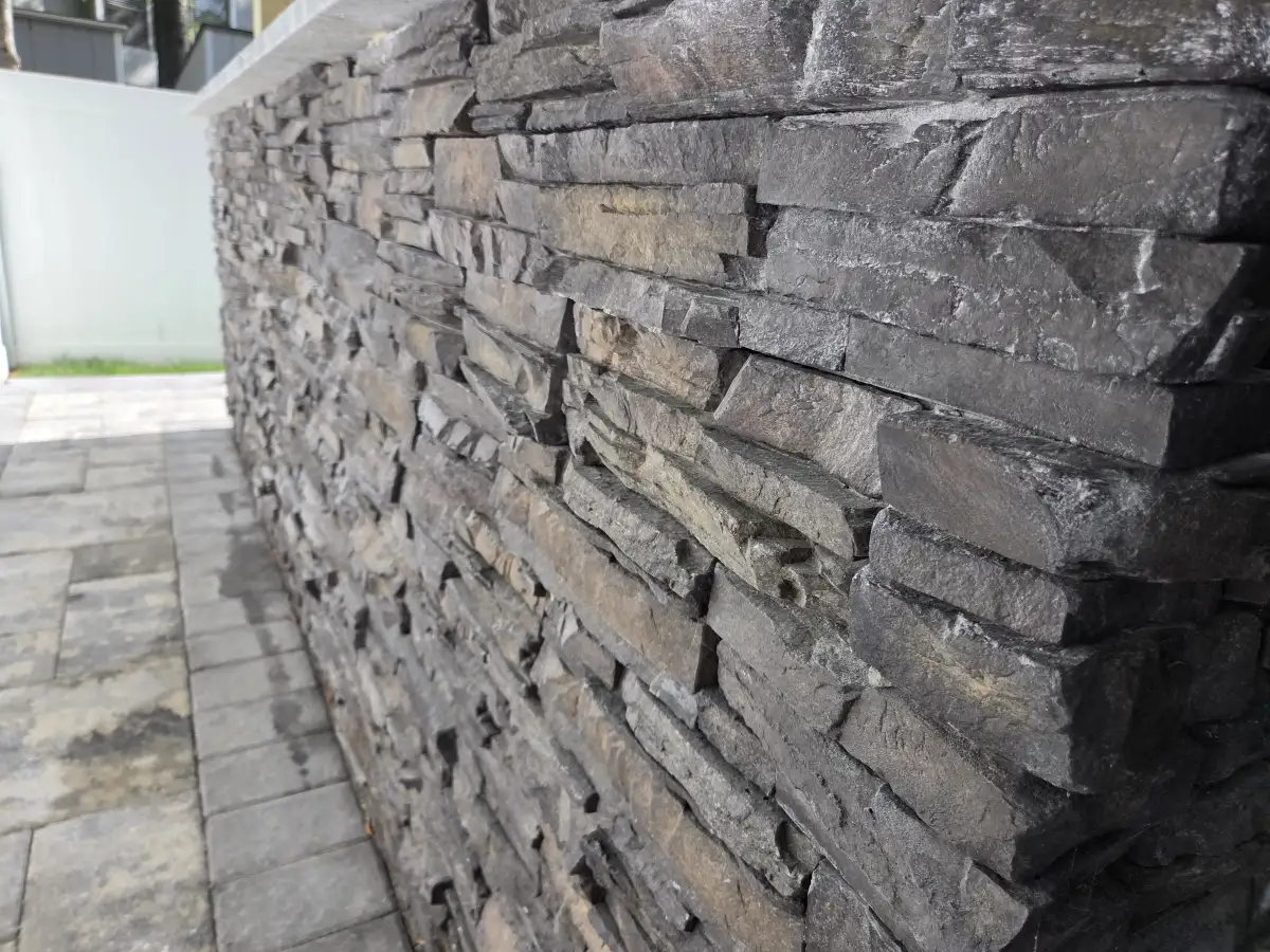 Retaining wall with tiered plantings in Sussex County